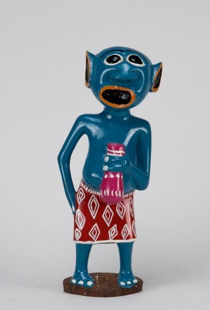 T. JANUARY (XXth). Carved polychrome wood...