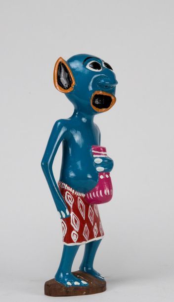 T. JANUARY (XXth). Carved polychrome wood...