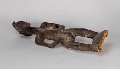 Senoufo sculpture. Woman and child under...