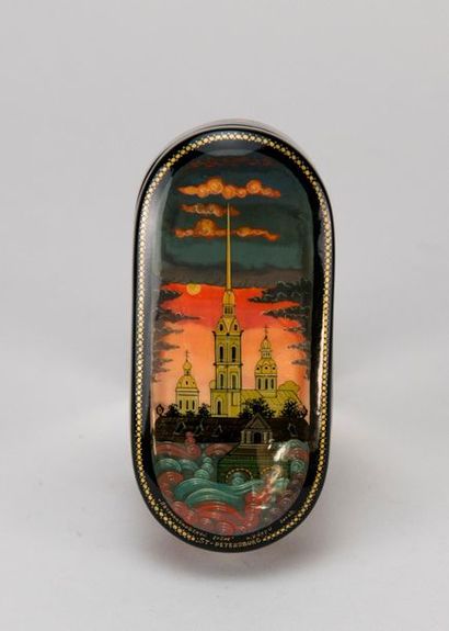 Oval lacquered wooden box decorated with...
