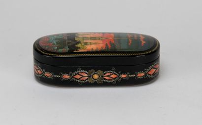 Oval lacquered wooden box decorated with...