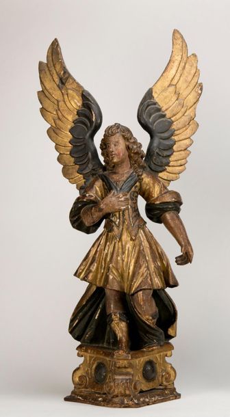 Paire d'anges baroques ailés en bois sculpté...