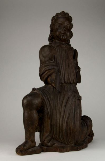 Ange agenouillé en bois sculpté, XVIIIème...