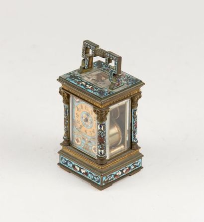 Pendulette, la cage émaillée à colonnes corinthiennes....