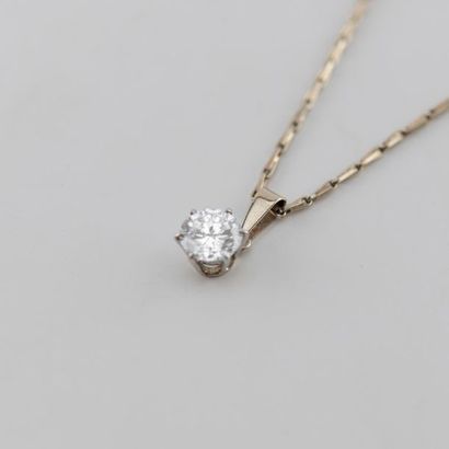 Diamond and its pendant with its chain, all...