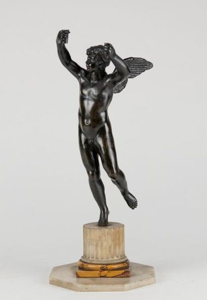 Winged genius in patinated bronze, column...