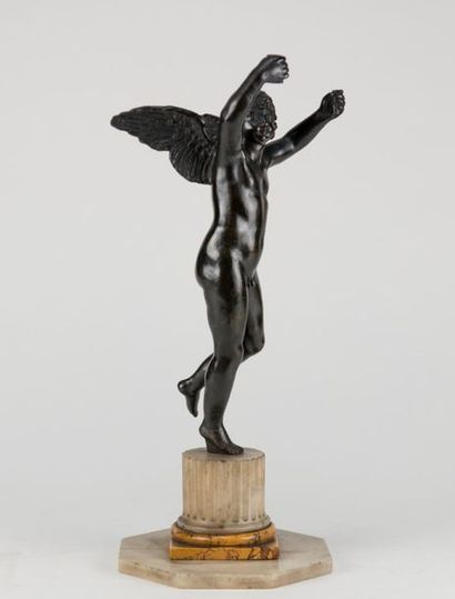 Winged genius in patinated bronze, column...