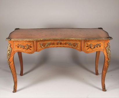 Flat wooden veneer desk decorated with flowers...