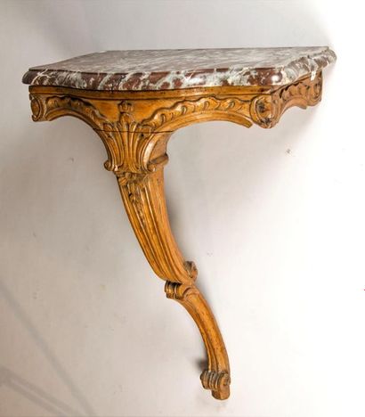 Small console in walnut molded and carved...