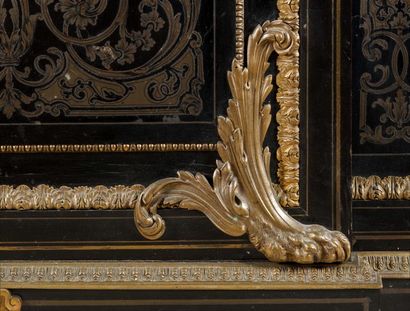 In-between cabinet made of brass veneer cut...