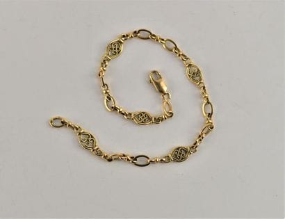 Bracelet en or jaune 18K (750 millièmes)...