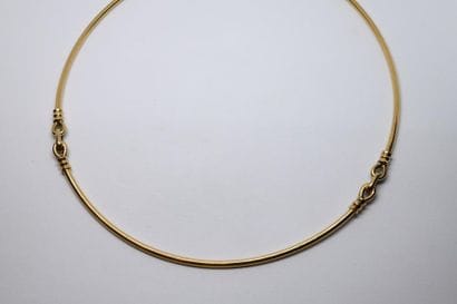 750°/00 yellow gold torque necklace with...