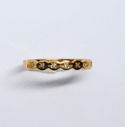 Half American wedding band in 750°/00 yellow...