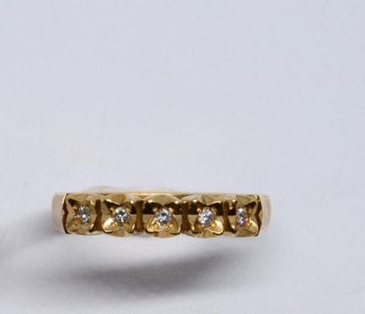 American half wedding band in 750°/00 yellow...