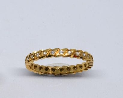 American wedding band in 750°/00 yellow gold,...