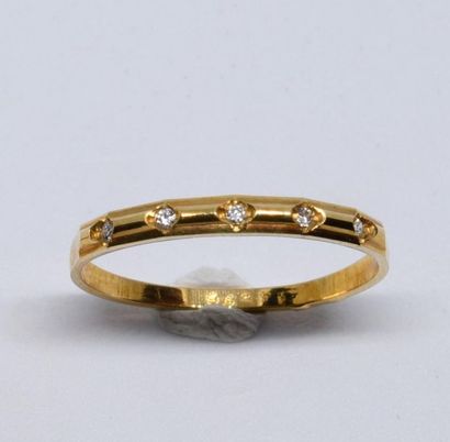 Half American wedding band in 750°/00 yellow...
