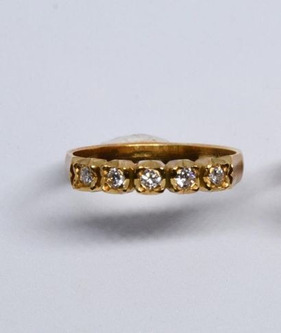 Half American wedding band in 750°/00 yellow...