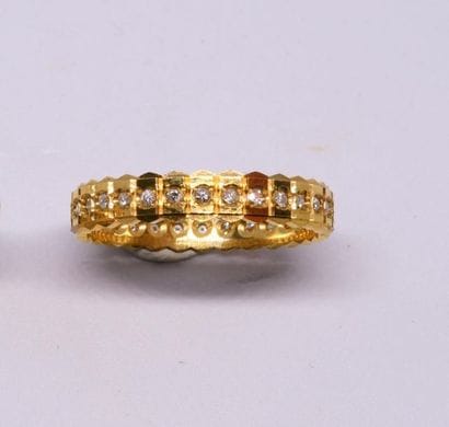 American wedding band in 750°/00 yellow gold...