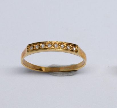 Half American wedding band in 750°/00 yellow...