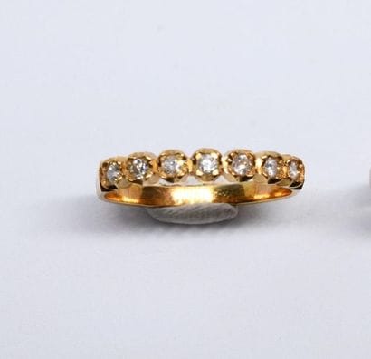Half American wedding band in 750°/00 yellow...