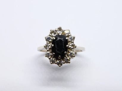 Daisy ring in 750°/00 white gold set with...