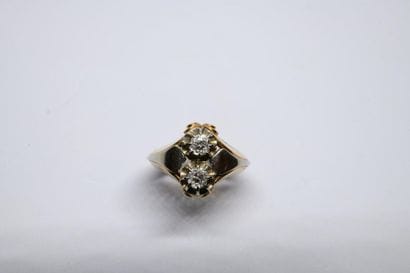 Important ring in 750°/00 yellow and white...