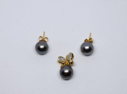 Half set in 750°/00 yellow gold and Tahitian...