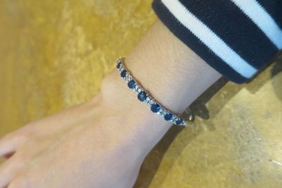 Modern bracelet, in 750°/00 white gold snake...