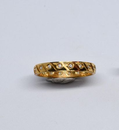 American wedding band in 750°/00 yellow gold...