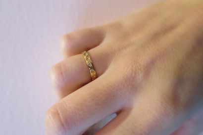 American wedding band in 750°/00 yellow gold...