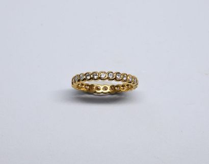 American wedding band in 750°/00 yellow gold,...