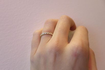 American wedding band in 750°/00 yellow gold,...