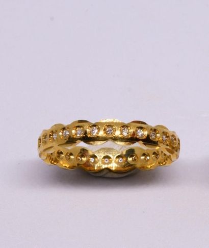 American wedding band in 750°/00 yellow gold,...