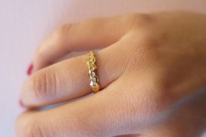 American wedding band in 750°/00 yellow gold,...