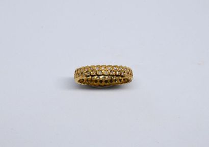Double American wedding ring in 750°/00 yellow...