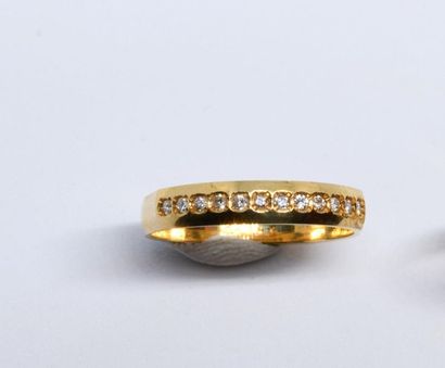 American half wedding band in 750°/00 yellow...