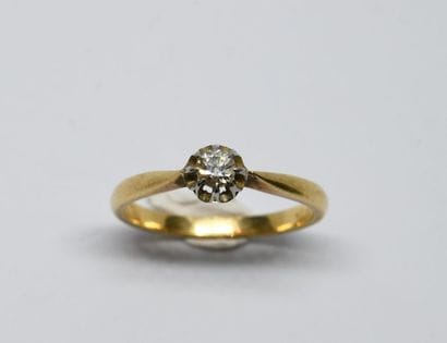 Solitaire set with an antique cut diamond...