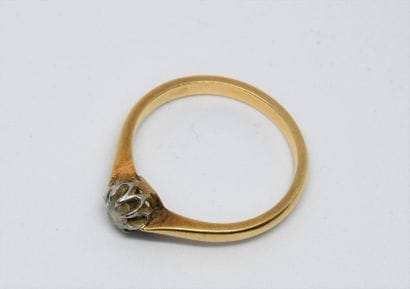 Solitaire set with an antique cut diamond...