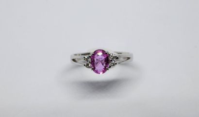 Modern ring decorated with an oval-shaped...