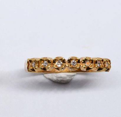 American half wedding band in 750°/00 yellow...