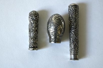Set of three hollow, embossed silver cane...