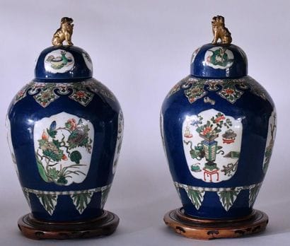 China, 19th century. Pair of covered vases...