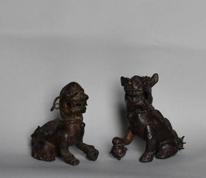 China, 19th century. 
Pair of bronze Fo dogs....