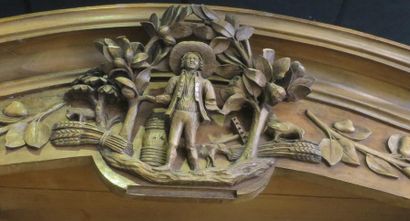 *A carved and moulded walnut cabinet, the...