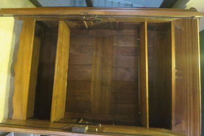 *Moulded and carved walnut cabinet on slightly...