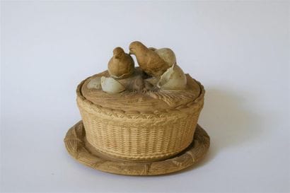 *Ceramic egg box, partially painted, showing...