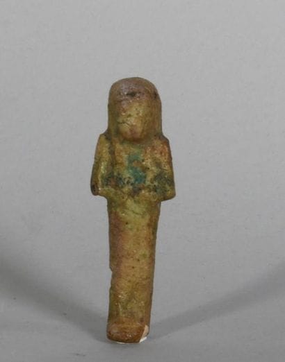 Oushebti in enamelled frit. 
Ancient Egypt
H:...