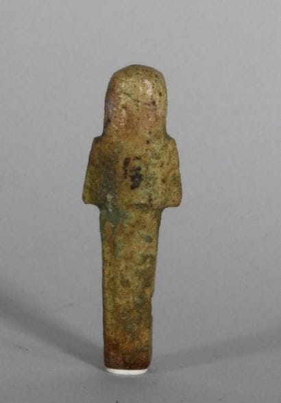 Oushebti in enamelled frit. 
Ancient Egypt
H:...