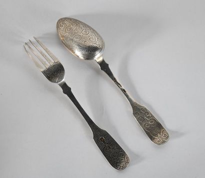 Russia. Covered in silver with spatulas and...