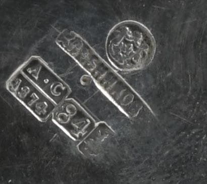 Russia. Round cup on a plain silver frame...